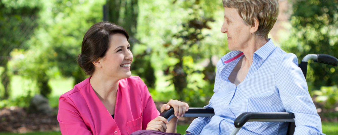 caregiver with her patient smiling